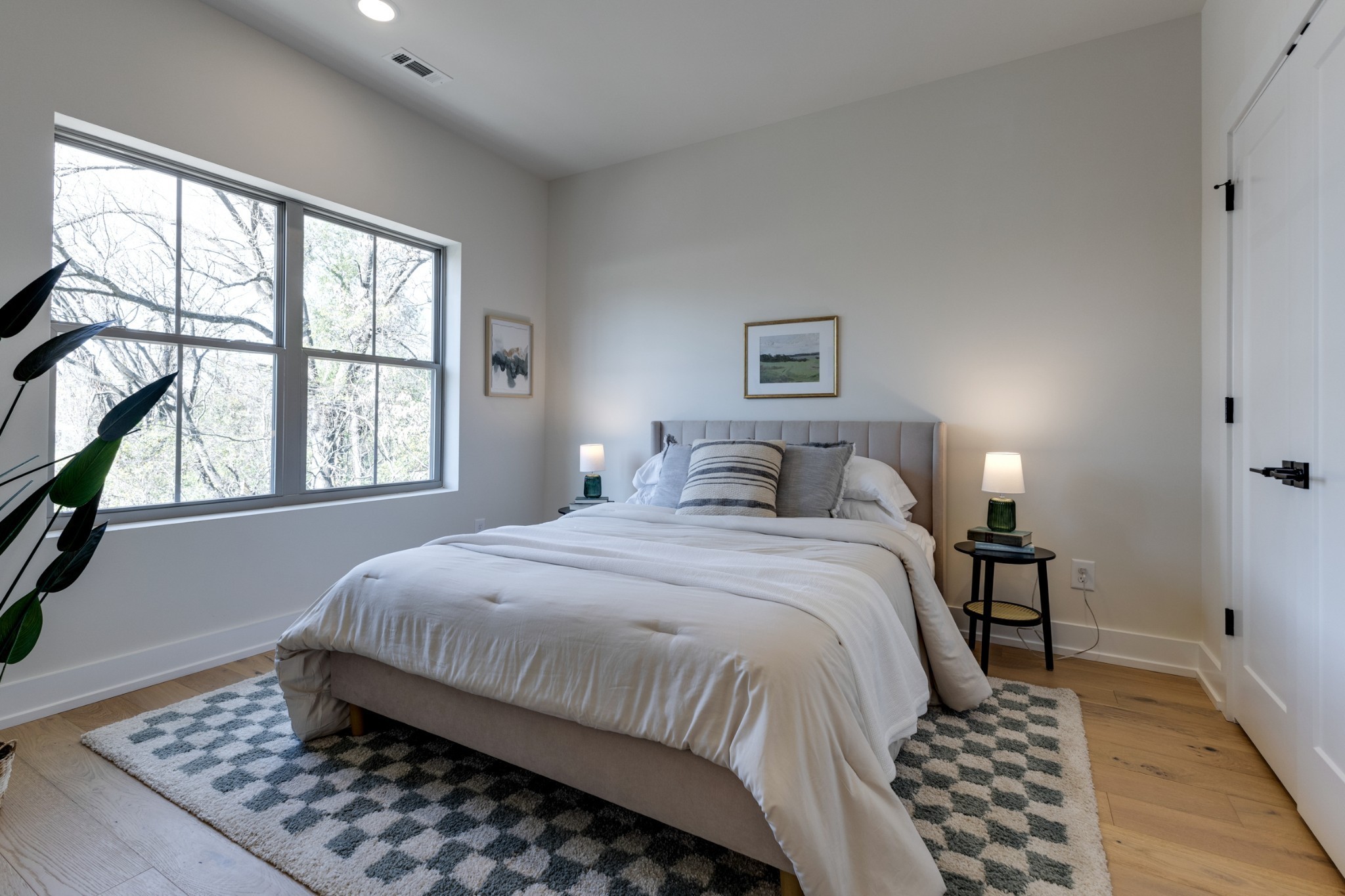 145 Whitsett Road, Unit 6 Nashville, TN 37210 - Photo 28 of 33 a bedroom with a bed and a window