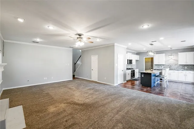 a view of a kitchen with a sink