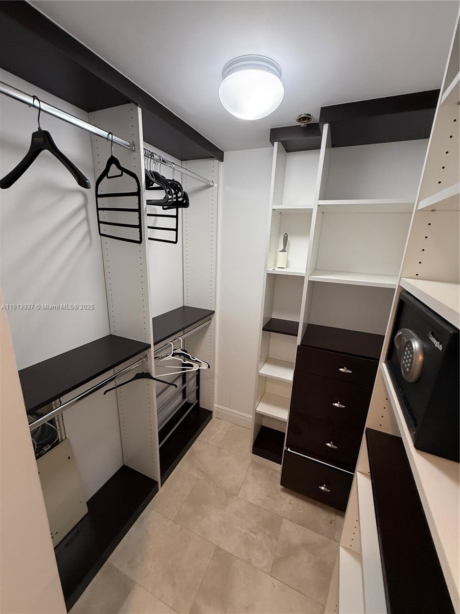 4100 Salzedo Street, Unit 811 Coral Gables, FL 33146 - Photo 18 of 28 a room with storage and utility