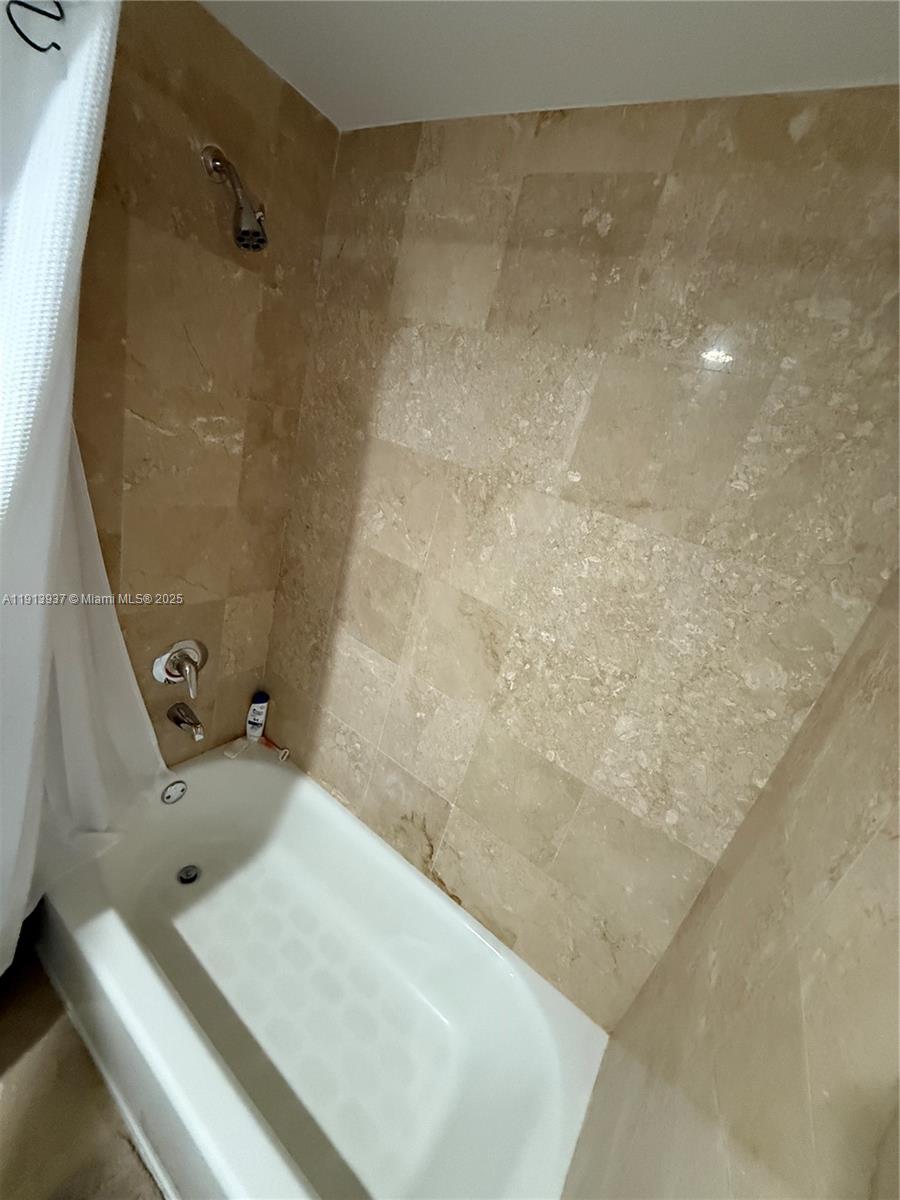 4100 Salzedo Street, Unit 811 Coral Gables, FL 33146 - Photo 27 of 28 a bathroom with a sink