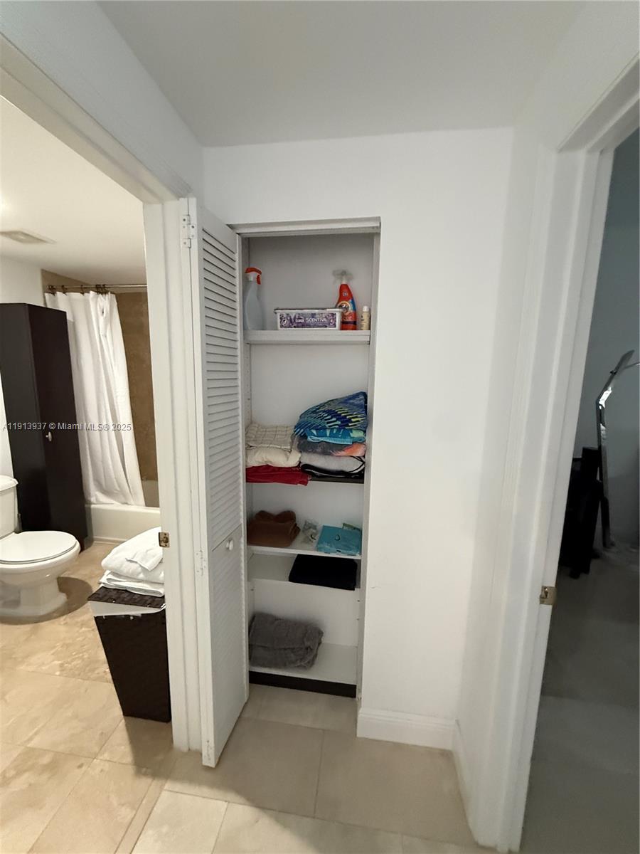 4100 Salzedo Street, Unit 811 Coral Gables, FL 33146 - Photo 28 of 28 a bathroom with a sink and a shower