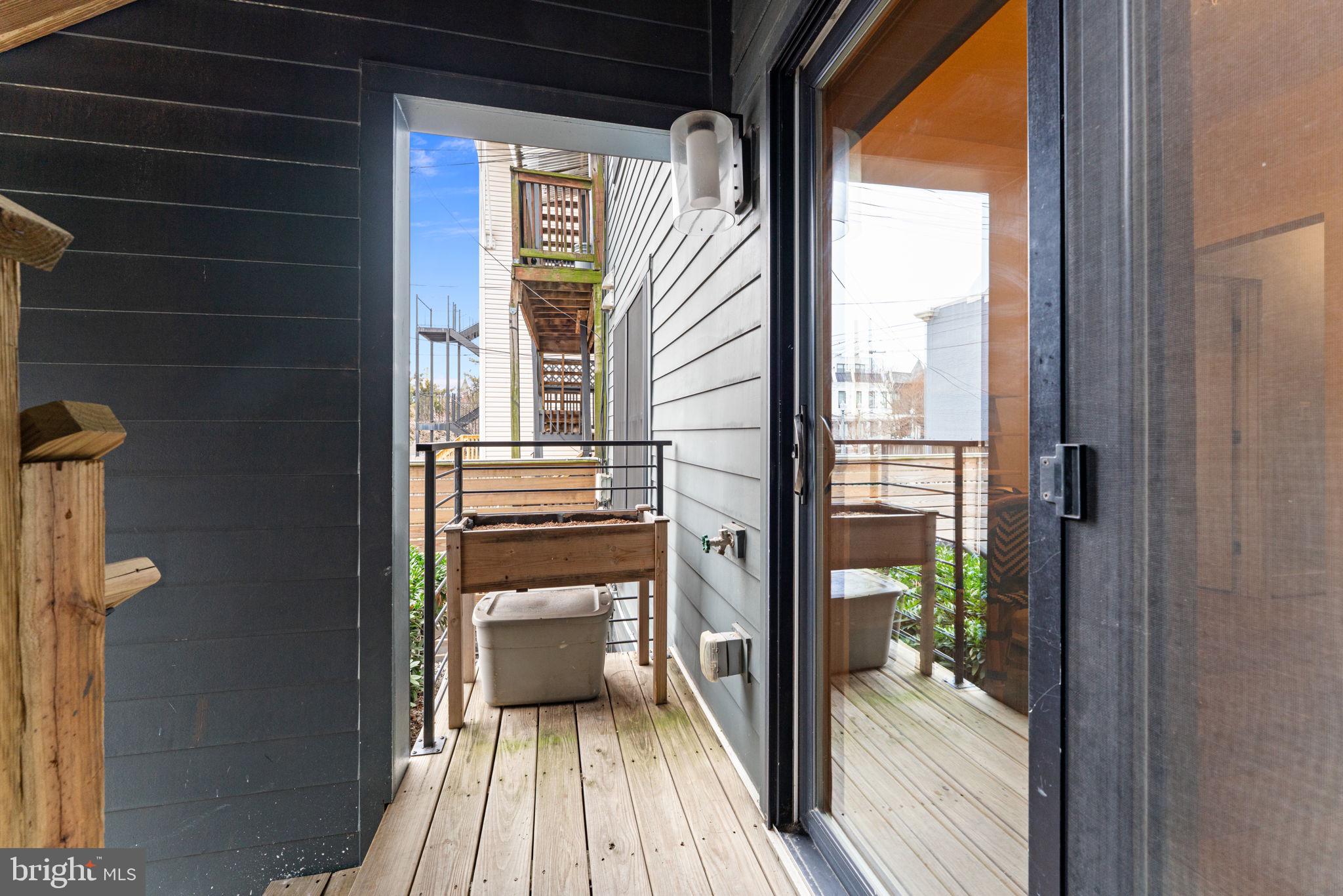 3435 14th Street Northwest, Unit 3 Washington, DC 20010 - Photo 17 of 19 a view of a balcony with wooden floor