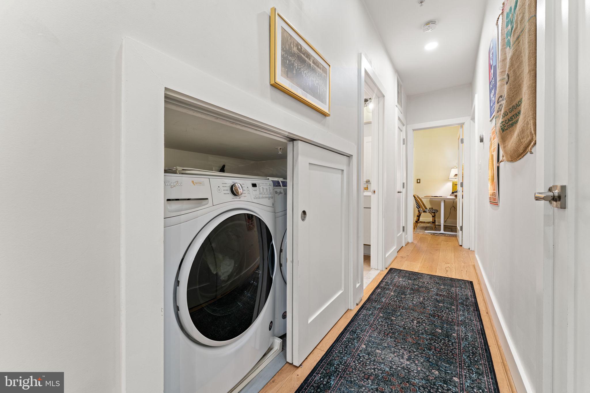 3435 14th Street Northwest, Unit 3 Washington, DC 20010 - Photo 8 of 19 a view of a hallway with washer and dryer