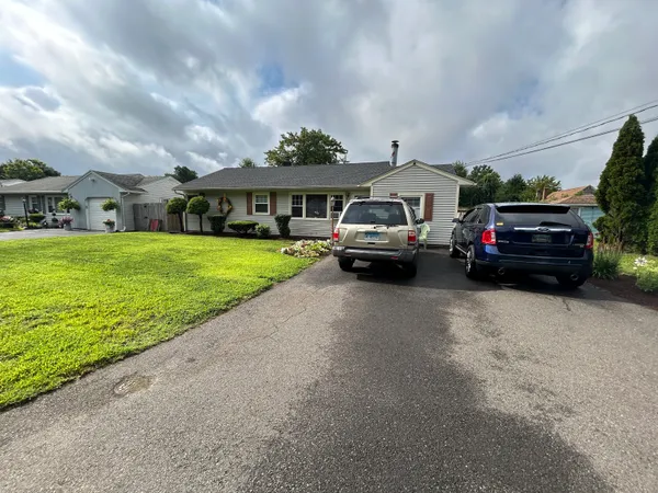 a car parked in front of the house