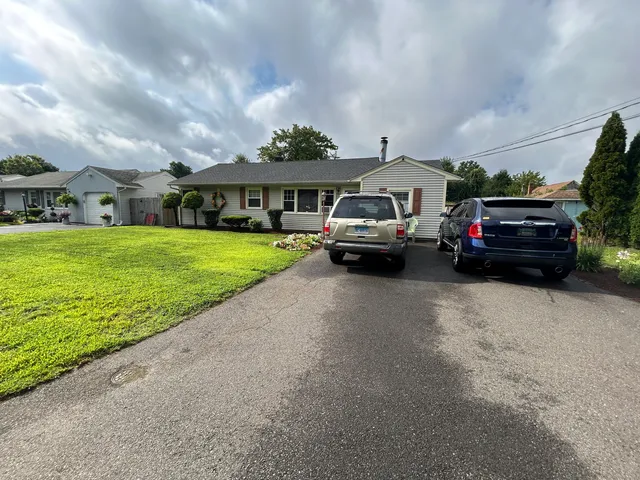 a car parked in front of the house