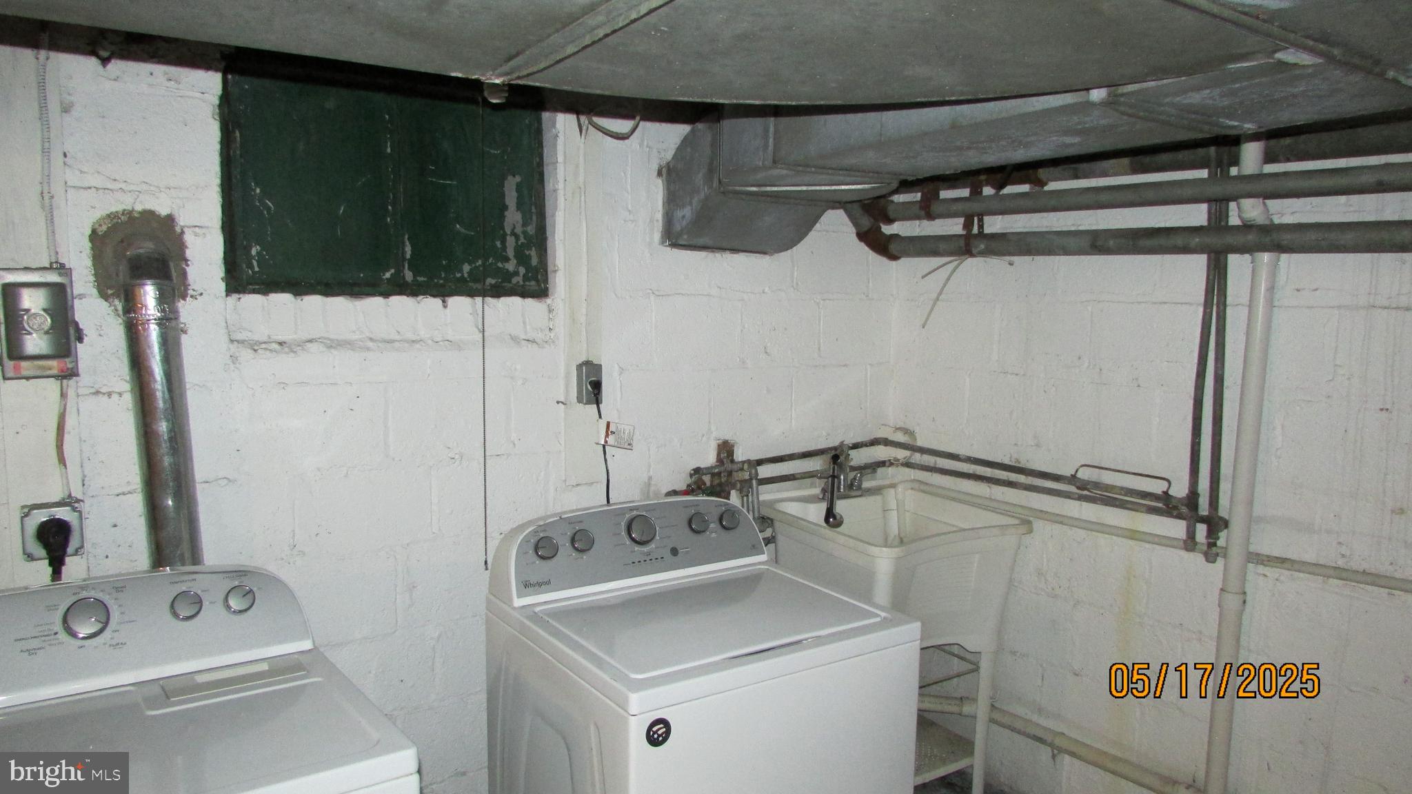 5901 Taylor Road Riverdale, MD 20737 - Photo 16 of 24 a bathroom with a sink toilet and shower
