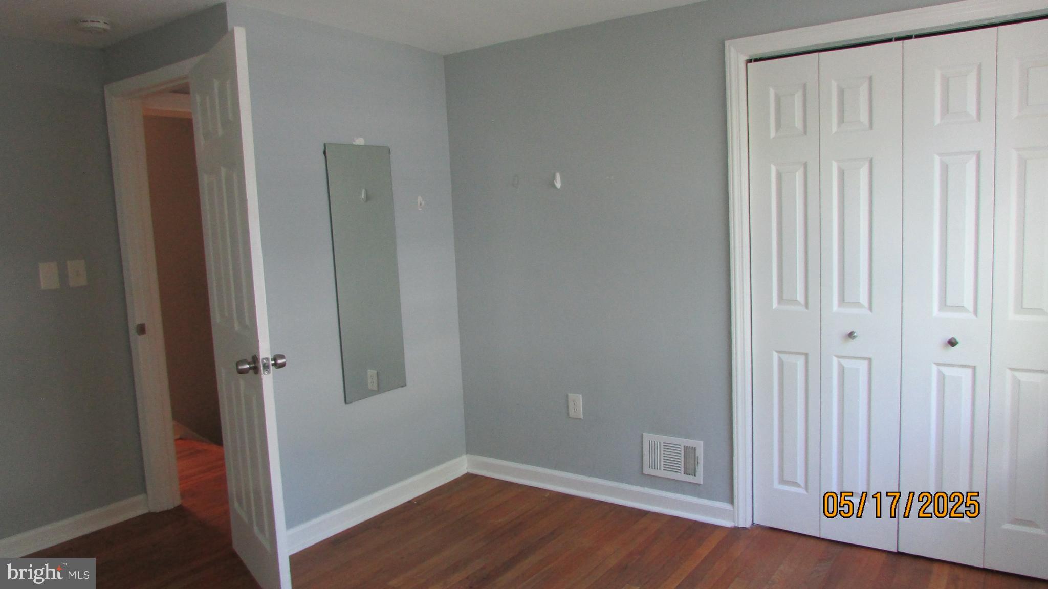 5901 Taylor Road Riverdale, MD 20737 - Photo 19 of 24 wooden floor in an empty room
