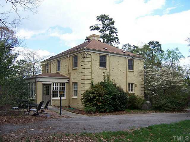 1918 Banbury Road Raleigh, NC 27608 - Photo 2 of 12 a front view of house with yard and trees around