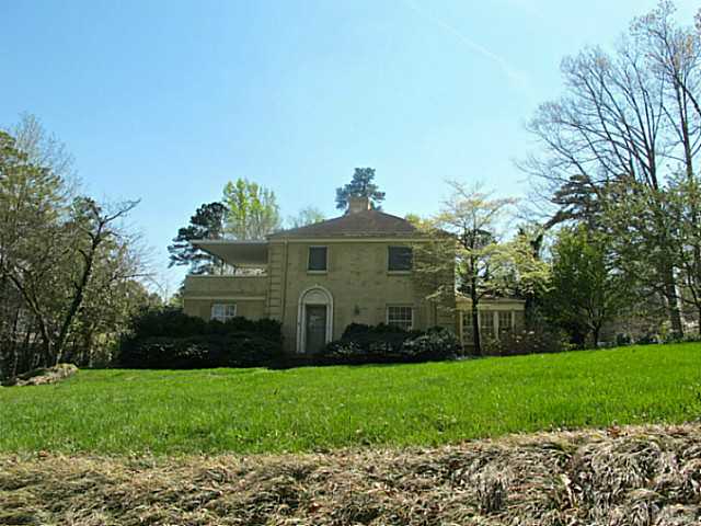 1918 Banbury Road Raleigh, NC 27608 - Photo 3 of 12 a front view of a house with a garden