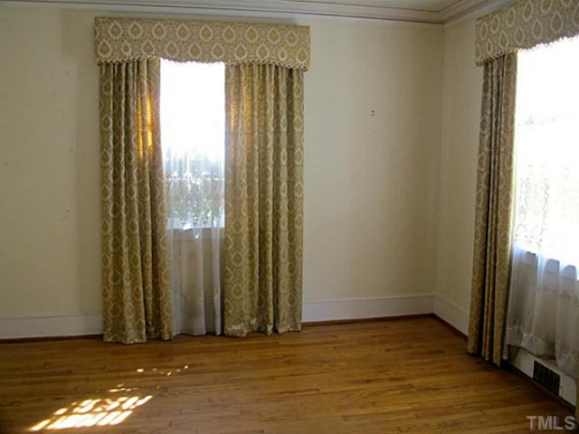 1918 Banbury Road Raleigh, NC 27608 - Photo 6 of 12 an empty room with window