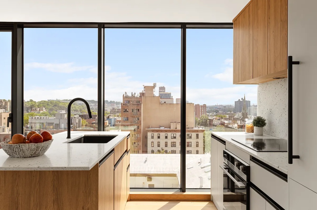 179 20th Street, Unit 9B Brooklyn, NY 11232 - Photo 4 of 13 a view of a kitchen with a sink and cabinets