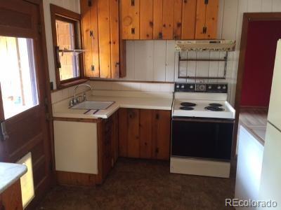 7865 Marriott Road Cascade, CO 80809 - Photo 4 of 5 a room with storage and utility