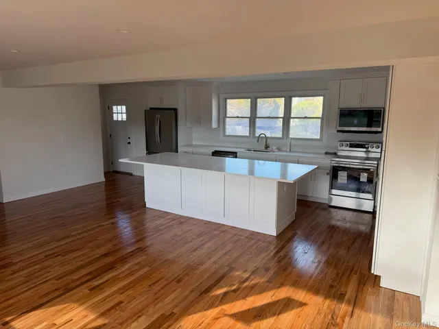 a bathroom with a shower and a toilet