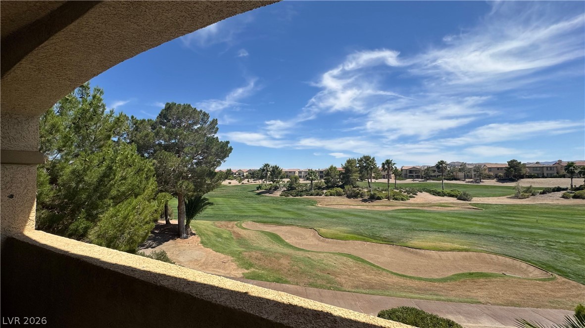87 Tall Ruff Drive Las Vegas, NV 89148 - Photo 34 of 71 A golf course property with verdant fairways and desert landscaping invites outdoor living.