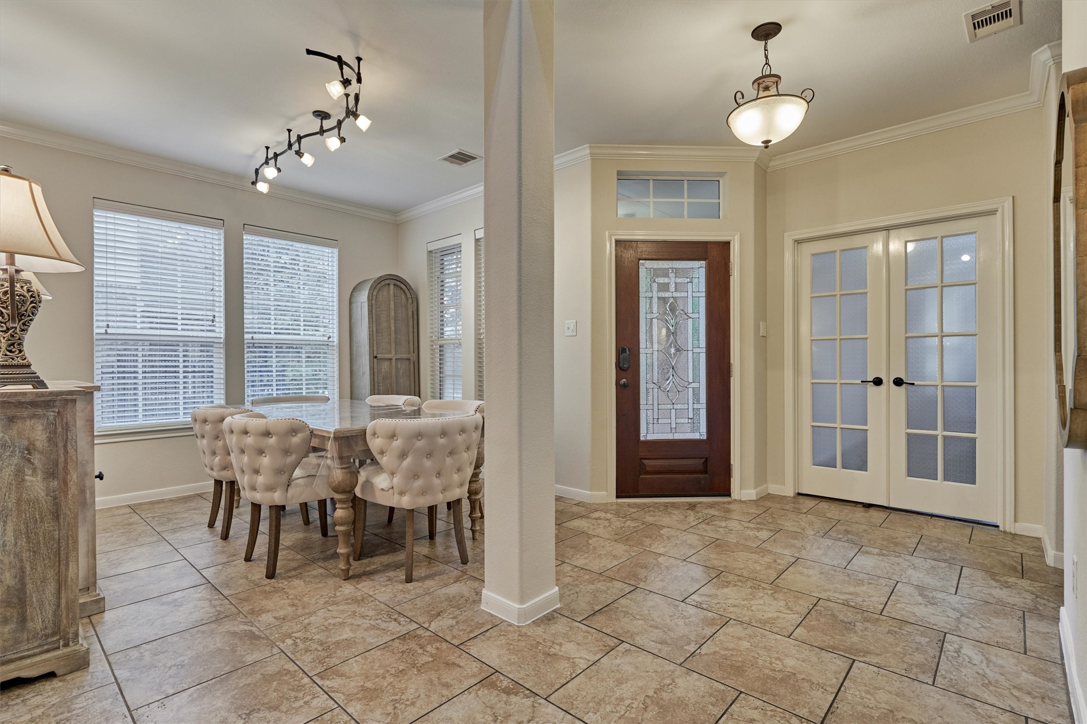 23 South Pinto Point Circle Spring, TX 77389 - Photo 7 of 44 a dining room with furniture chandelier and window