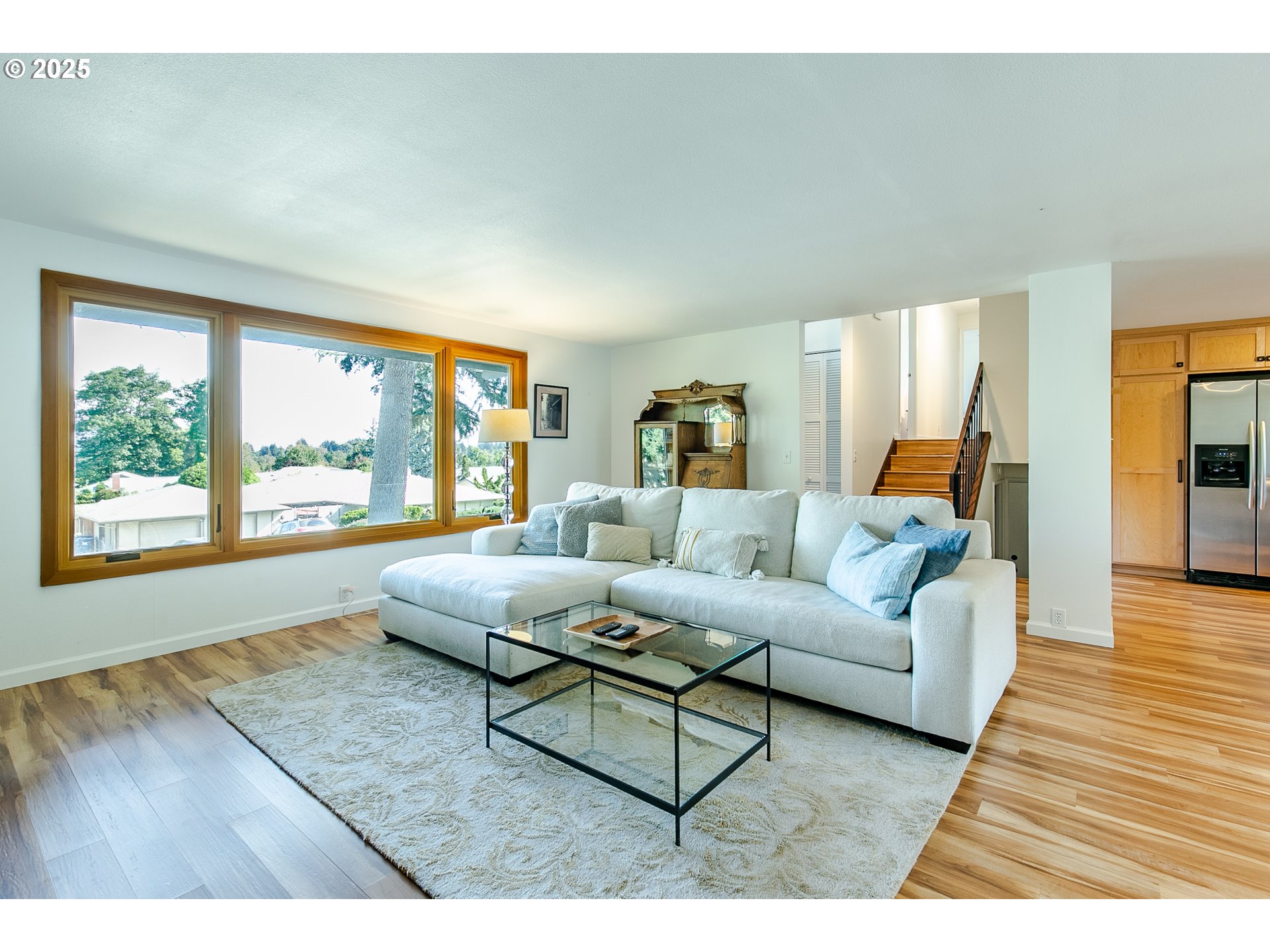 2724 Malibu Way Eugene, OR 97405 - Photo 12 of 48 a living room with furniture and a large window