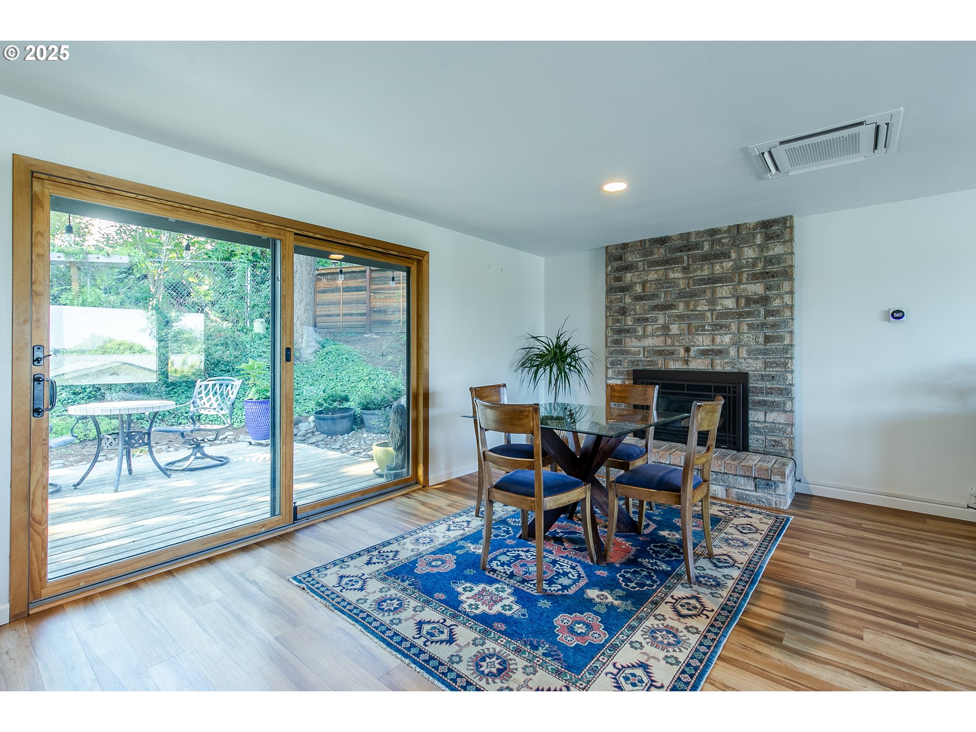 2724 Malibu Way Eugene, OR 97405 - Photo 15 of 48 a living room with furniture and a fireplace
