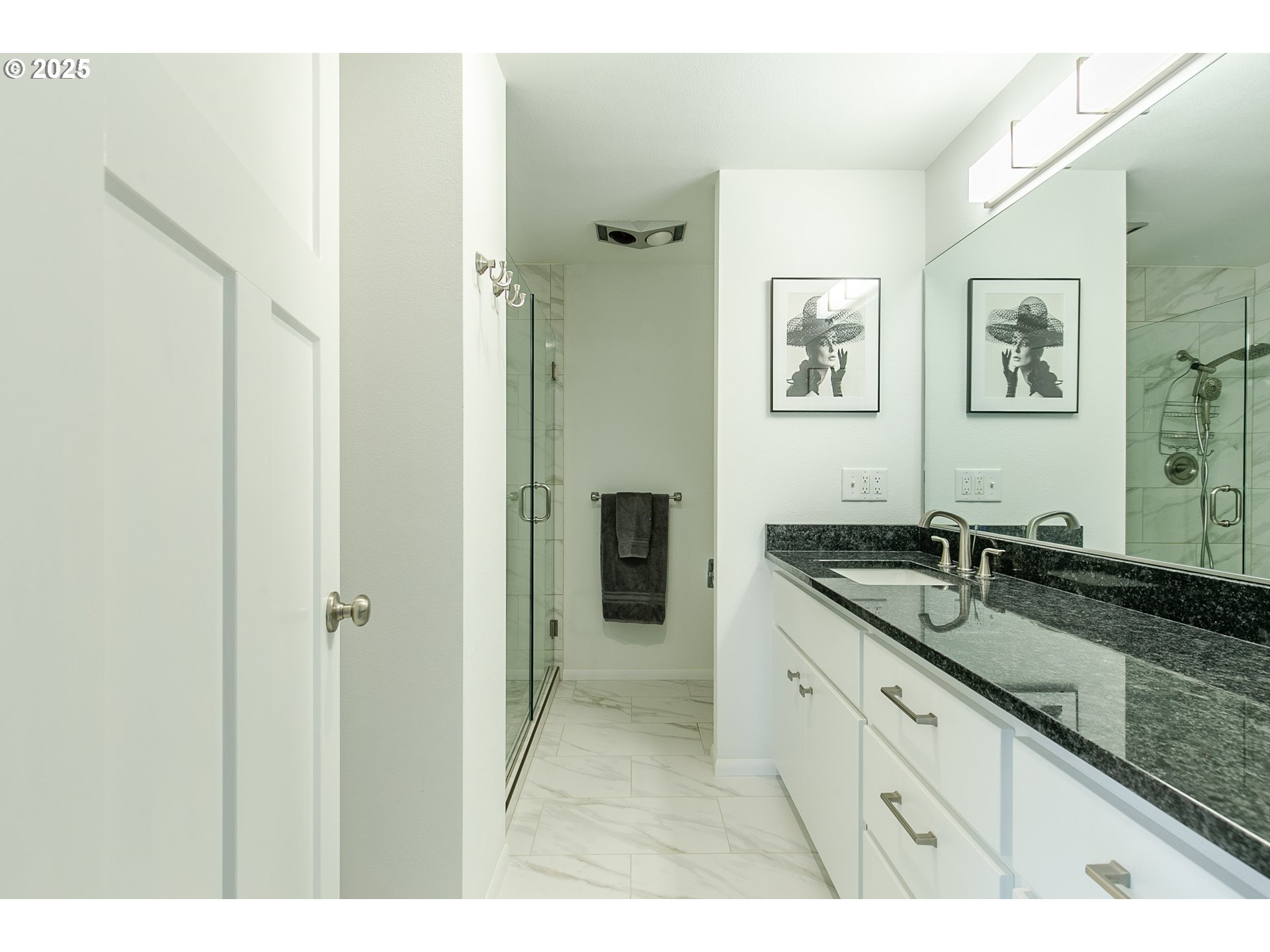 2724 Malibu Way Eugene, OR 97405 - Photo 30 of 48 a spacious bathroom with a granite countertop sink and a mirror