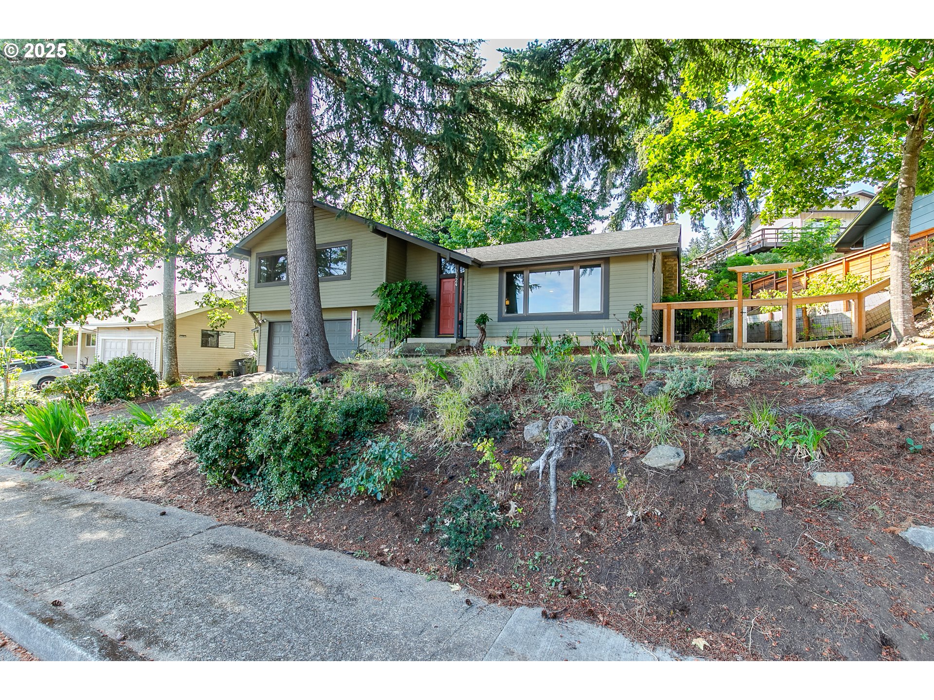 2724 Malibu Way Eugene, OR 97405 - Photo 3 of 48 a house view with a backyard space