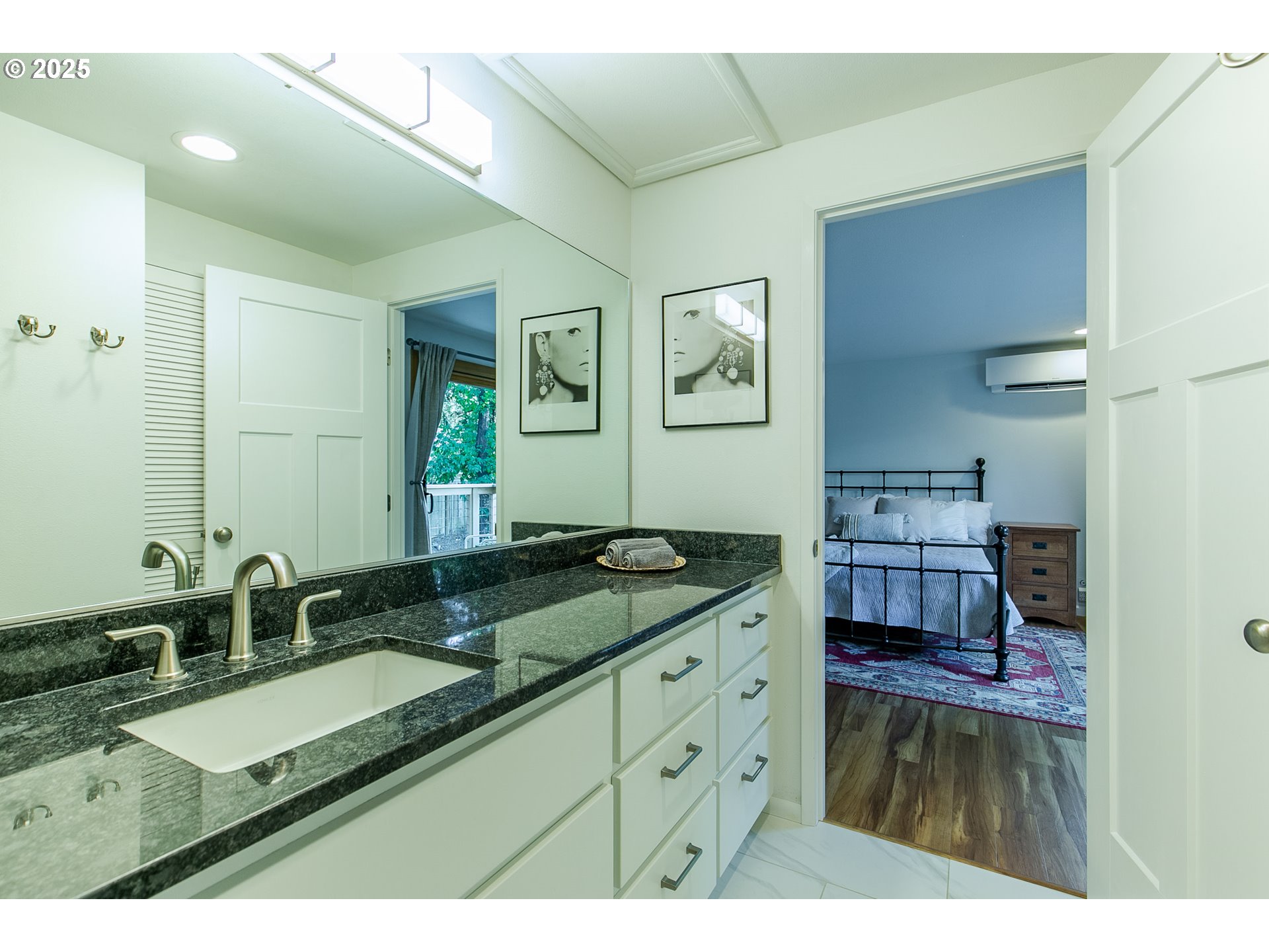2724 Malibu Way Eugene, OR 97405 - Photo 32 of 48 a bathroom with a granite countertop sink and a mirror