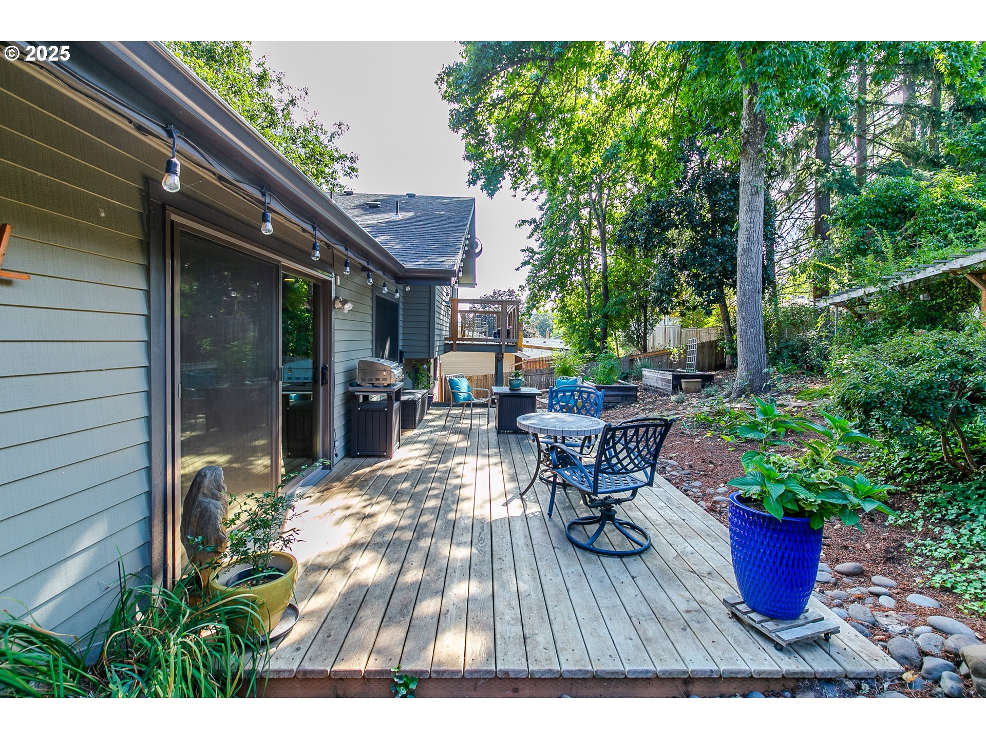 2724 Malibu Way Eugene, OR 97405 - Photo 44 of 48 a view of house with backyard outdoor seating and green space