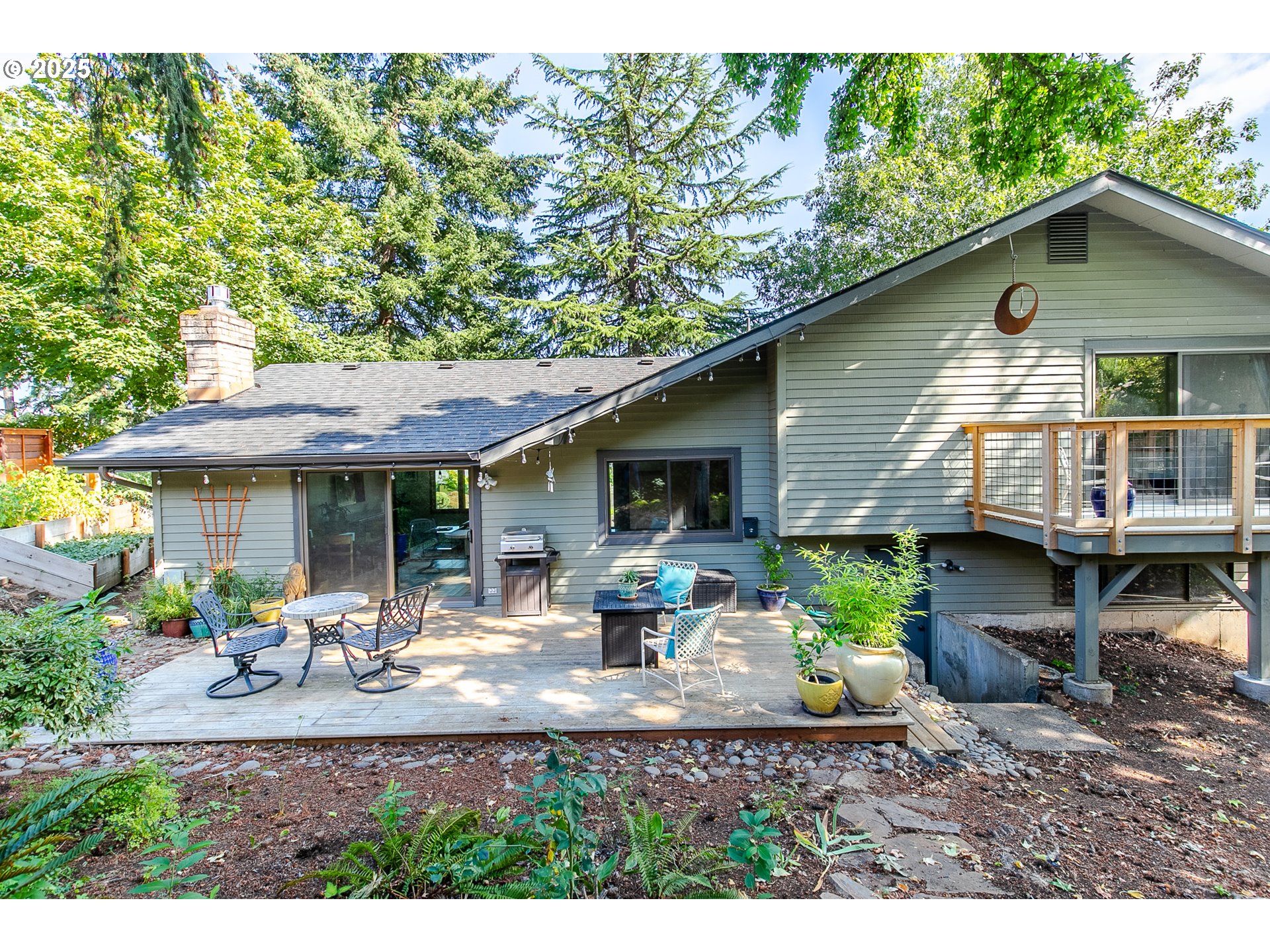 2724 Malibu Way Eugene, OR 97405 - Photo 46 of 48 a view of a house with backyard and sitting area
