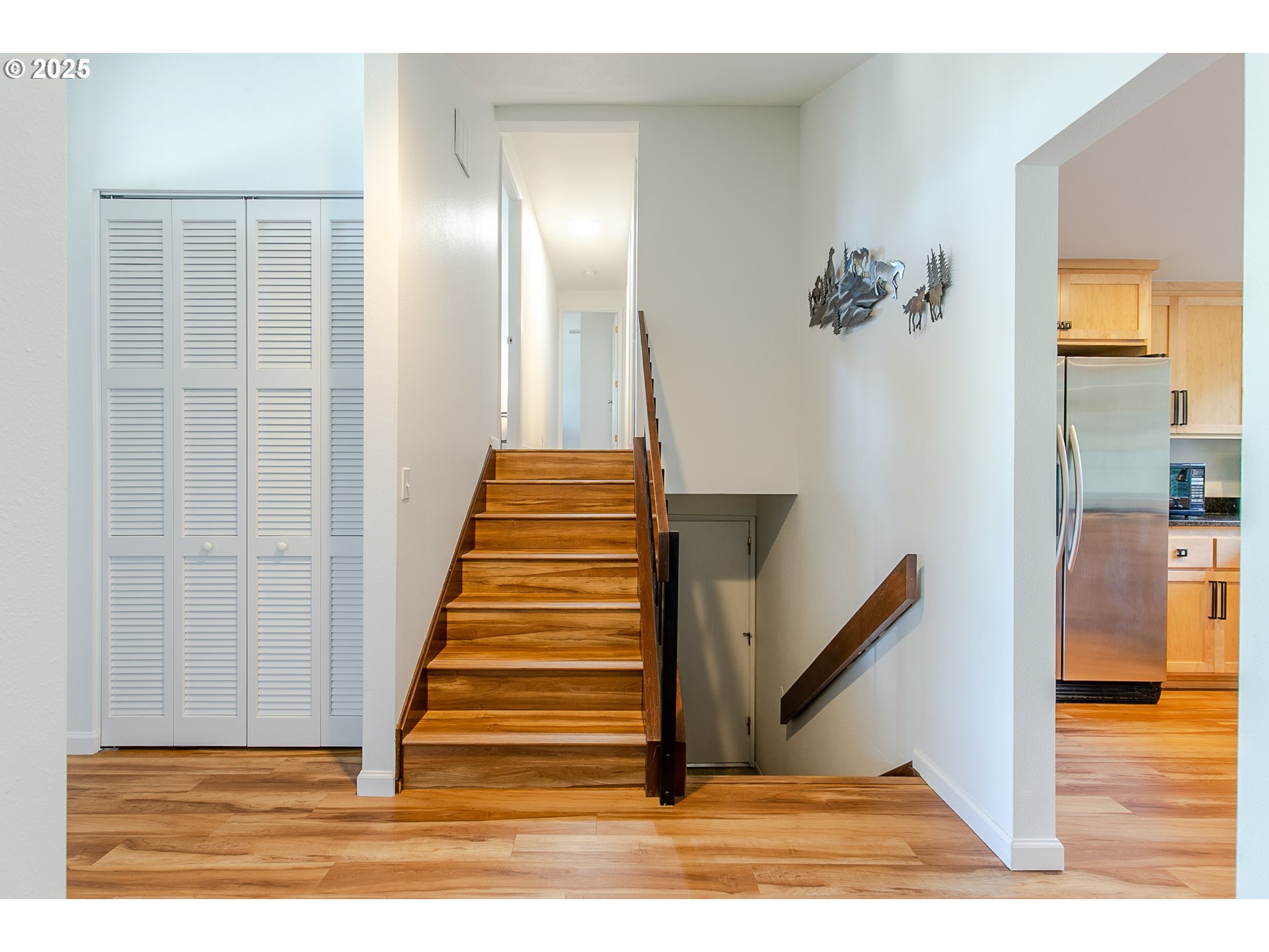 2724 Malibu Way Eugene, OR 97405 - Photo 6 of 48 a view of entryway and hall with wooden floor