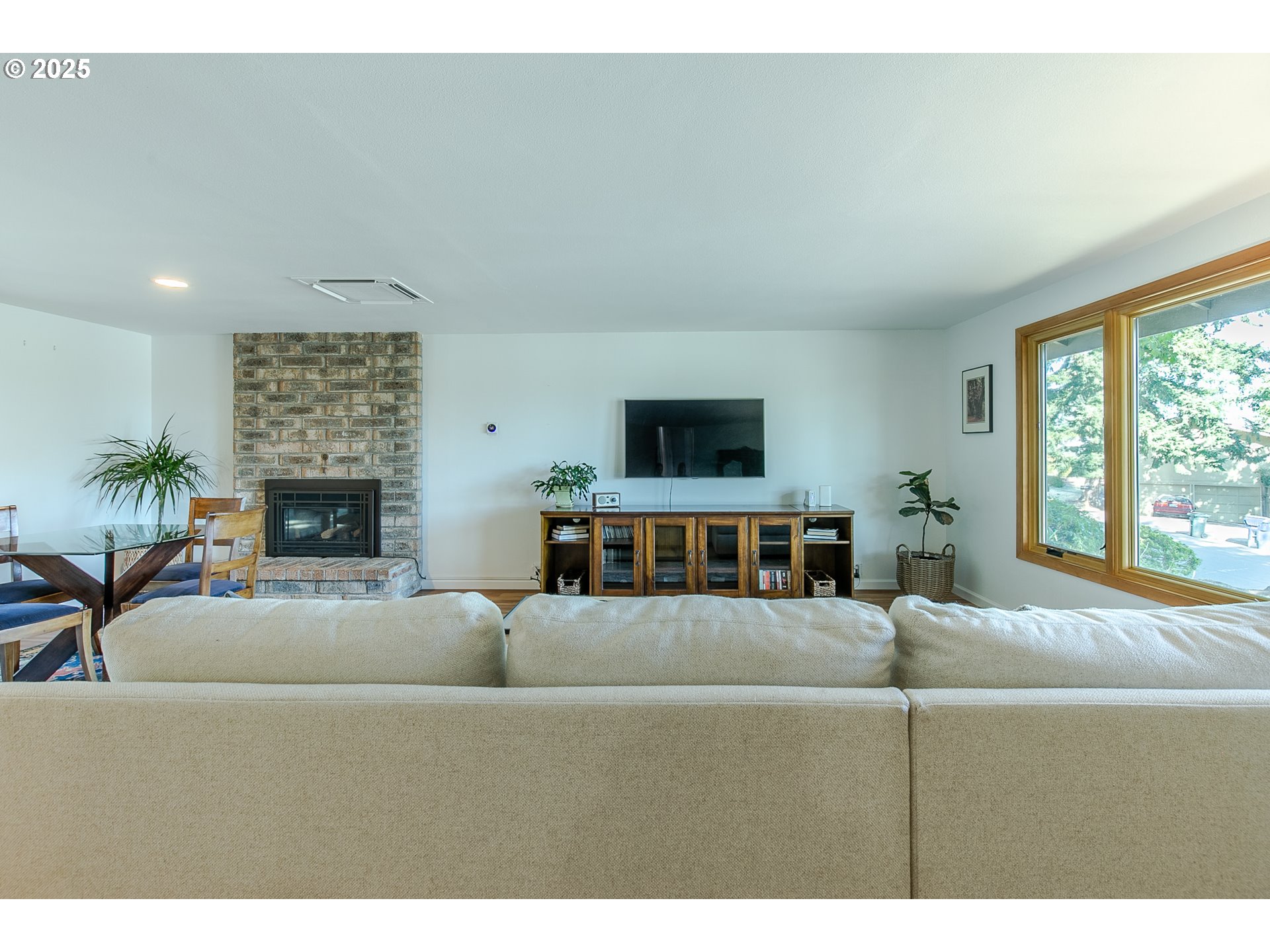 2724 Malibu Way Eugene, OR 97405 - Photo 8 of 48 a living room with furniture and a fireplace