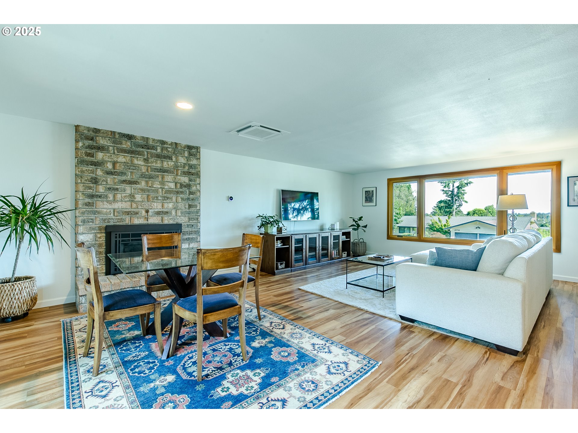 2724 Malibu Way Eugene, OR 97405 - Photo 10 of 48 a living room with furniture and a fireplace