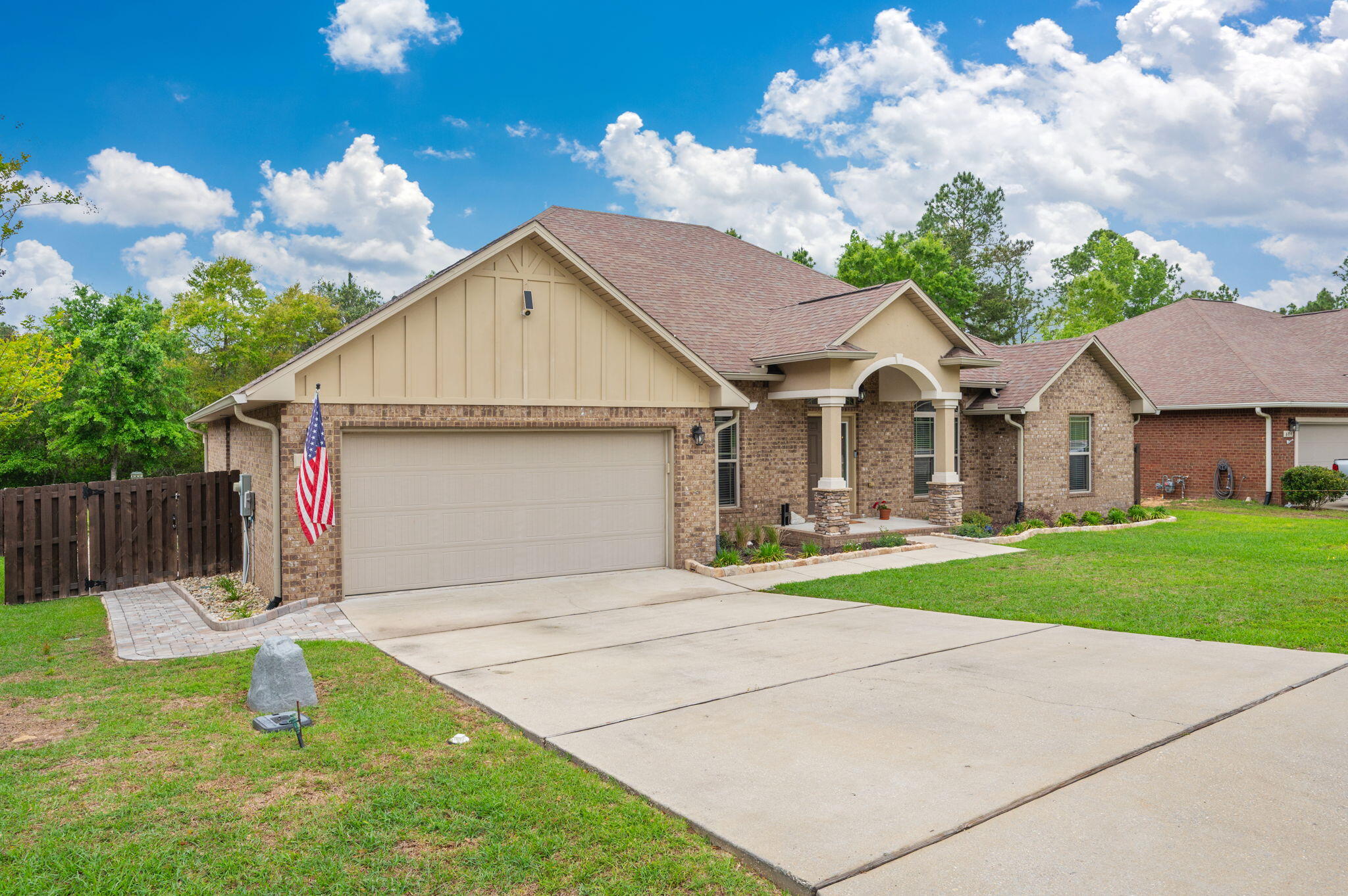 611 Terrier Trail Crestview, FL 32536 - Photo 23 of 64 a view of backyard of house and garage