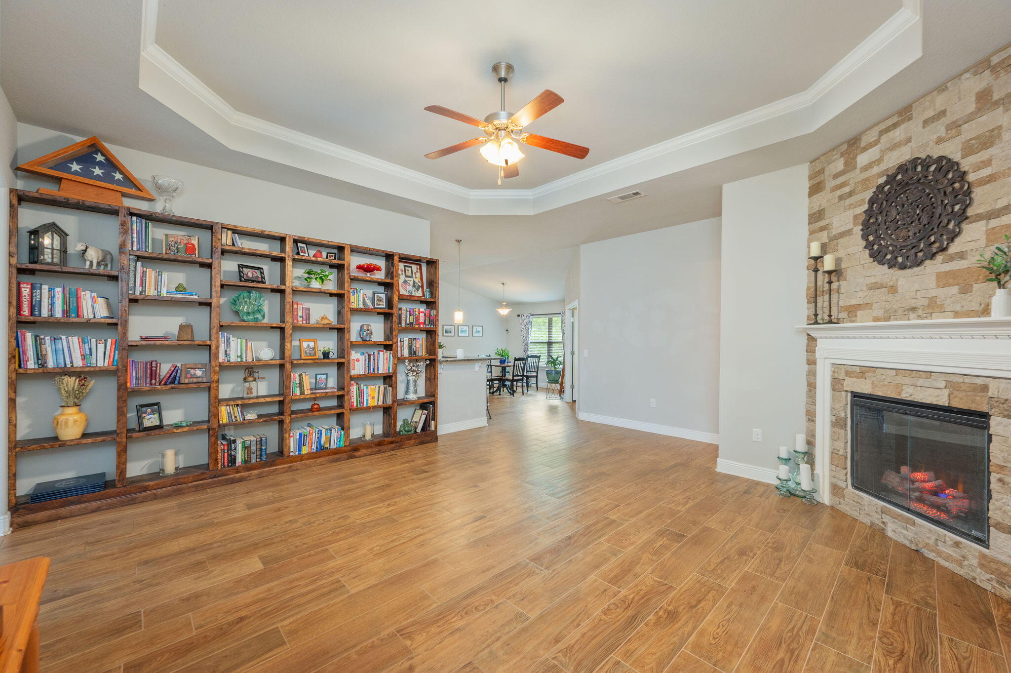 611 Terrier Trail Crestview, FL 32536 - Photo 31 of 64 a view of an empty room with a fireplace and a workspace