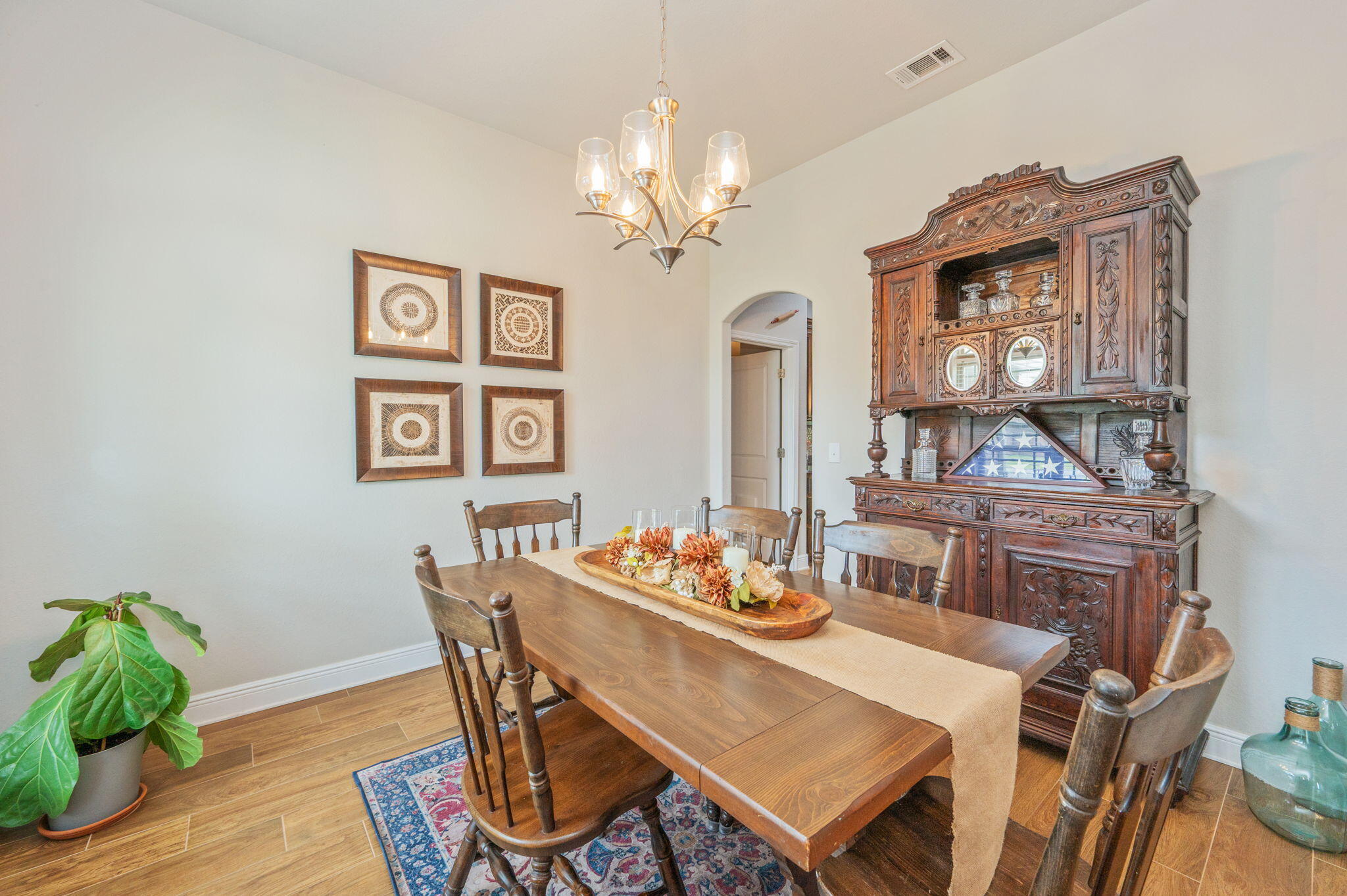 611 Terrier Trail Crestview, FL 32536 - Photo 33 of 64 a view of a dining room with furniture window and wooden floor