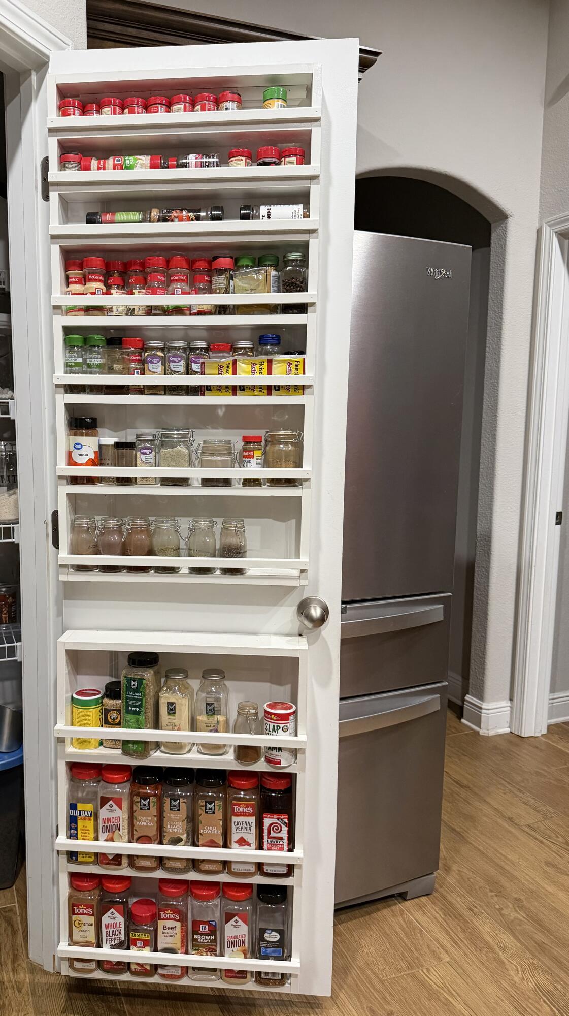 611 Terrier Trail Crestview, FL 32536 - Photo 41 of 64 a view of water heater with wooden floor