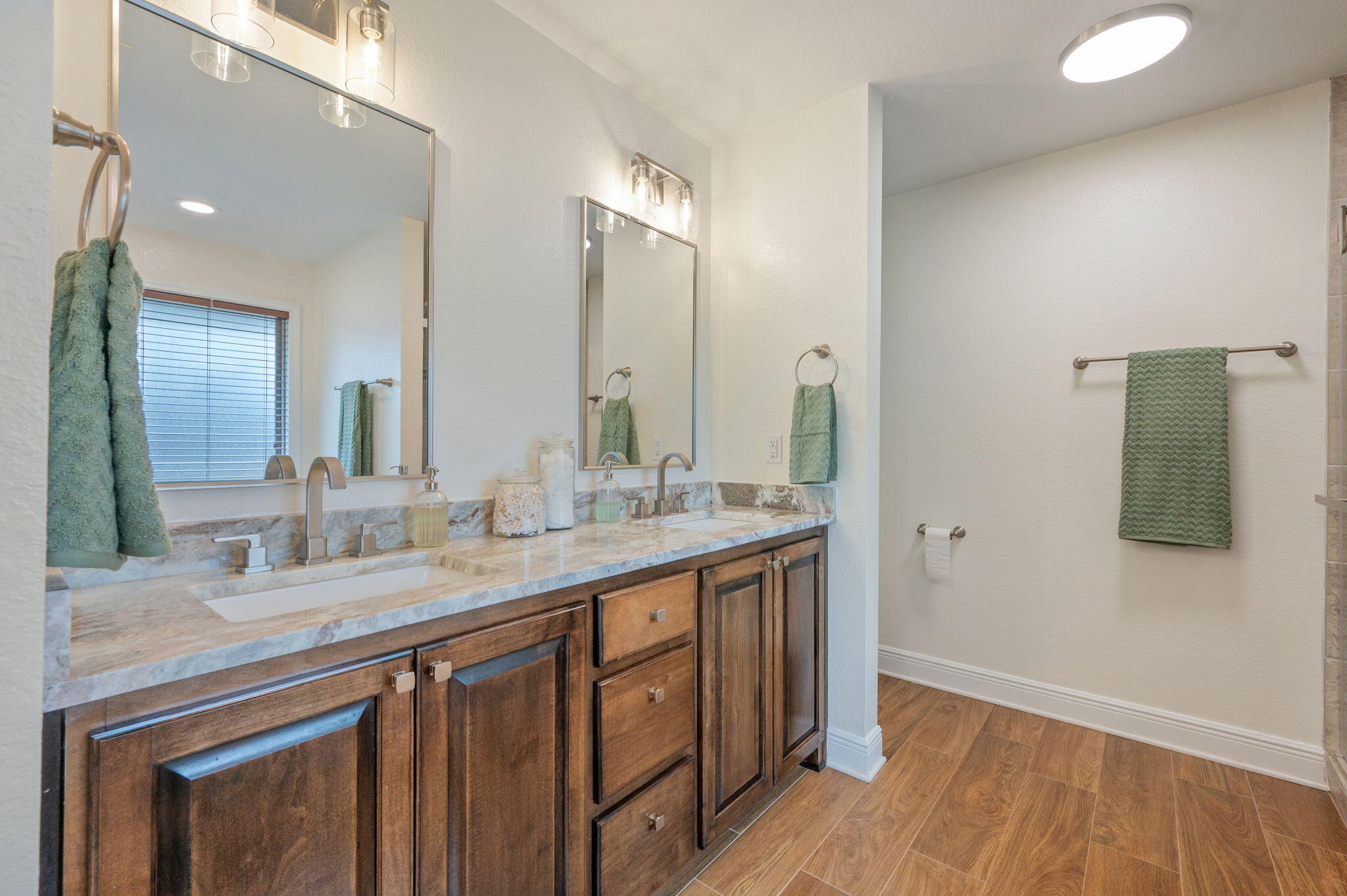 611 Terrier Trail Crestview, FL 32536 - Photo 47 of 64 a bathroom with a granite countertop sink and a mirror