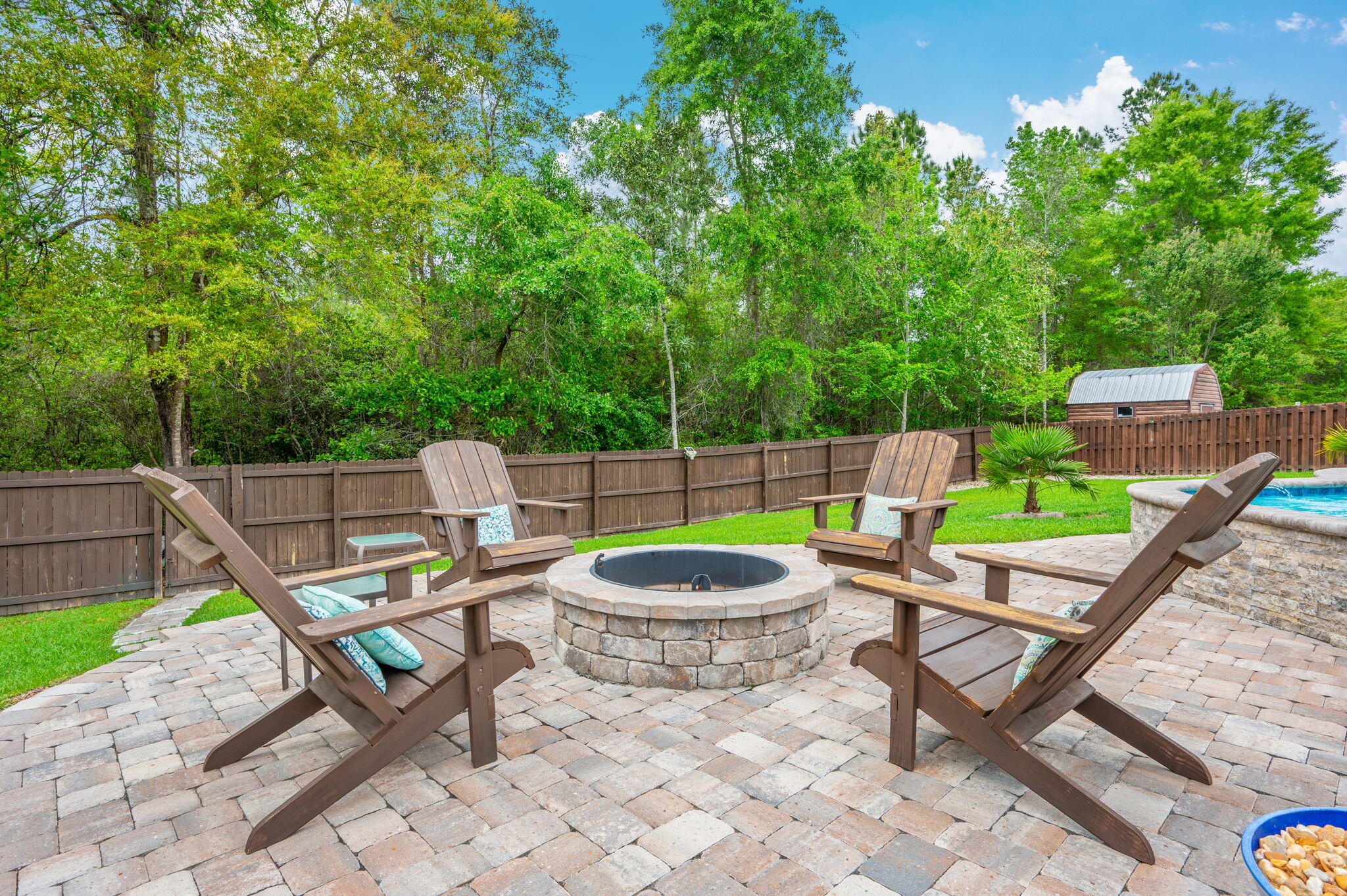 611 Terrier Trail Crestview, FL 32536 - Photo 5 of 64 a chairs and a table in a backyard