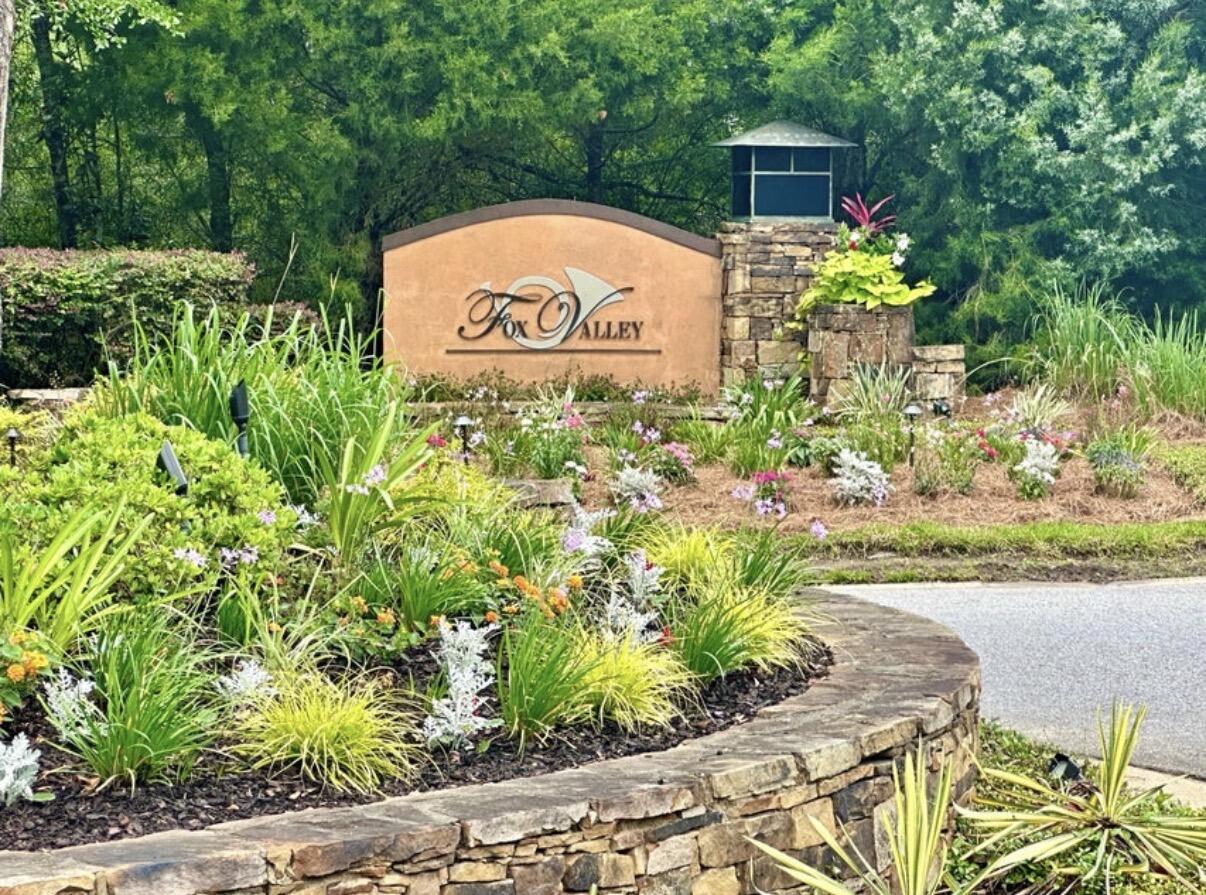 611 Terrier Trail Crestview, FL 32536 - Photo 63 of 64 a sign that is sitting in front of a tree