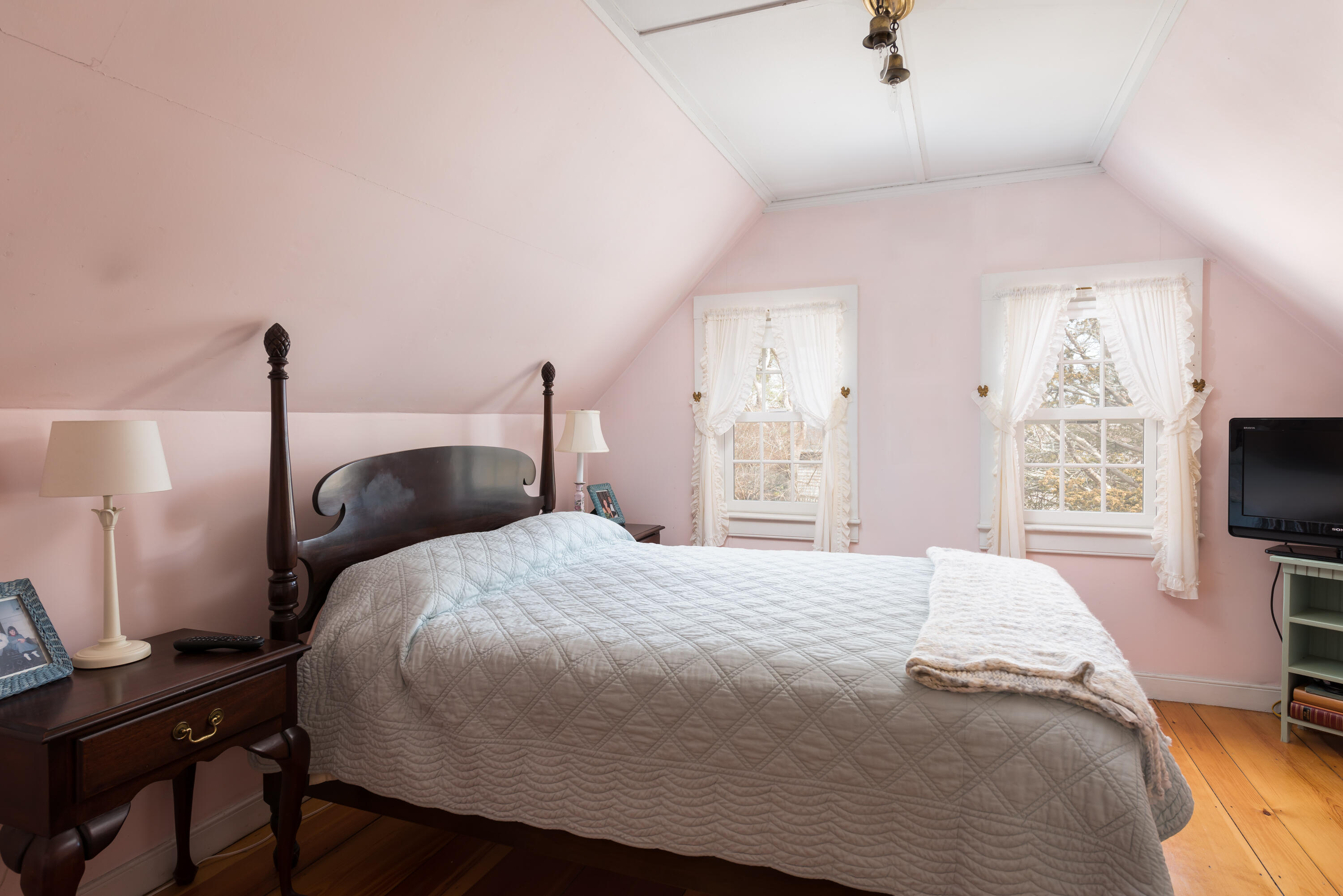 16 Jefferson Shs Road Buzzards Bay, MA 02532 - Photo 17 of 28 a bedroom with a bed and a flat screen tv