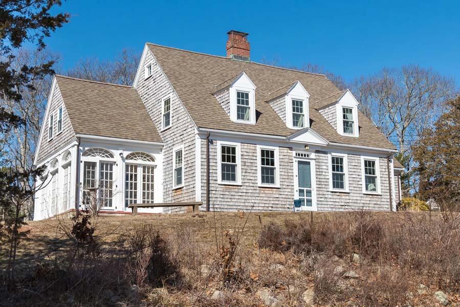 16 Jefferson Shs Road Buzzards Bay, MA 02532 - Photo 21 of 28 a front view of a house with a yard