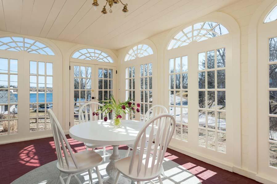 16 Jefferson Shs Road Buzzards Bay, MA 02532 - Photo 5 of 28 a view of a dining room with furniture wooden floor and chandelier