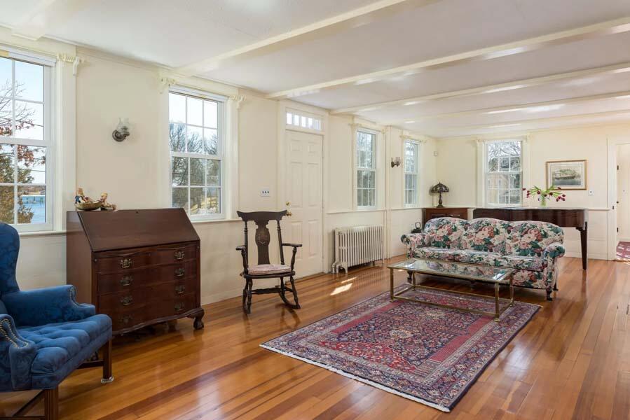 16 Jefferson Shs Road Buzzards Bay, MA 02532 - Photo 8 of 28 a living room with furniture and a rug