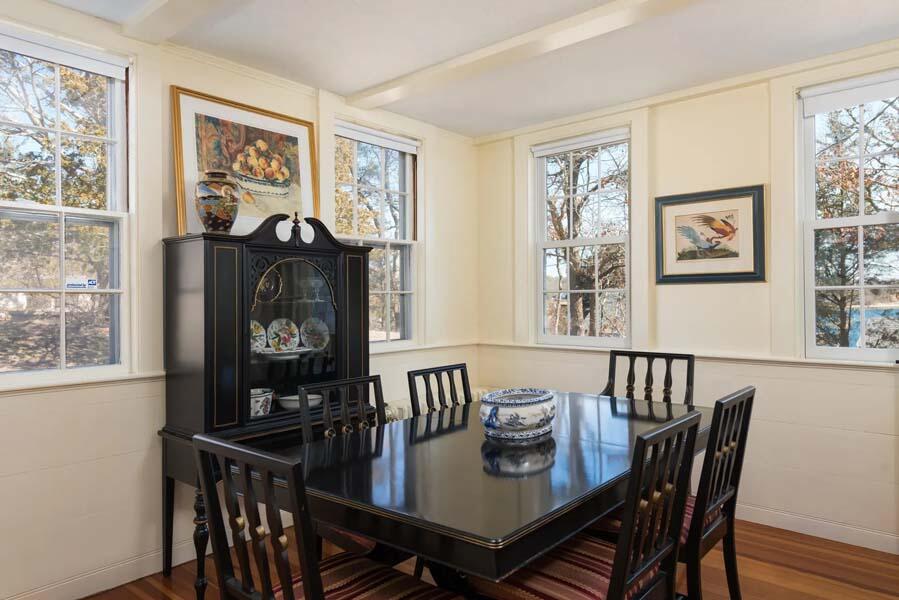 16 Jefferson Shs Road Buzzards Bay, MA 02532 - Photo 9 of 28 a view of a dining room with furniture a chandelier and wooden floor