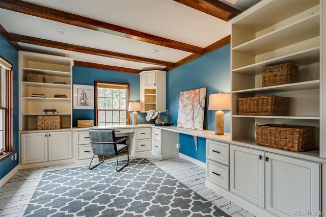 a work place with a chair and gym equipment