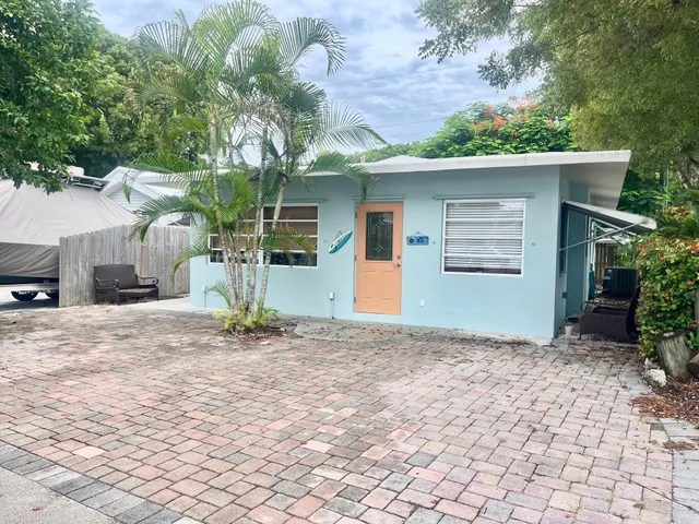 a view of a house with a garage