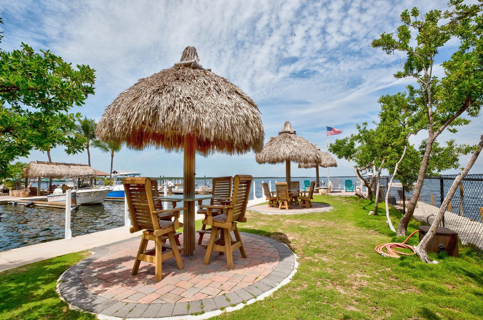 101620 Overseas Highway, Unit 5N Key Largo, FL 33037 - Photo 24 of 28 a view of a backyard with sitting area
