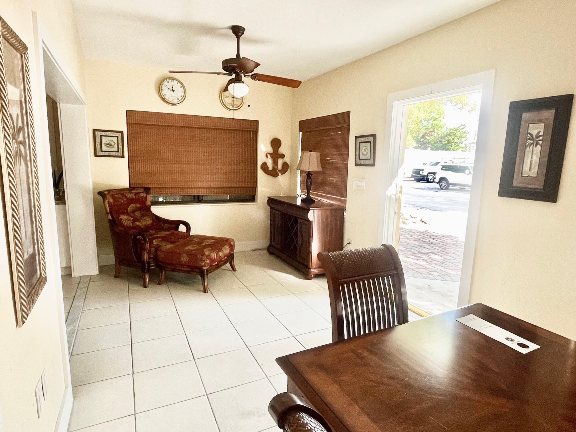 101620 Overseas Highway, Unit 5N Key Largo, FL 33037 - Photo 4 of 28 a living room with furniture