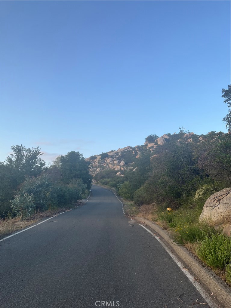 44810 La Mancha Road Temecula, CA 92590 - Photo 2 of 10 a view of a road with a mountain in the background