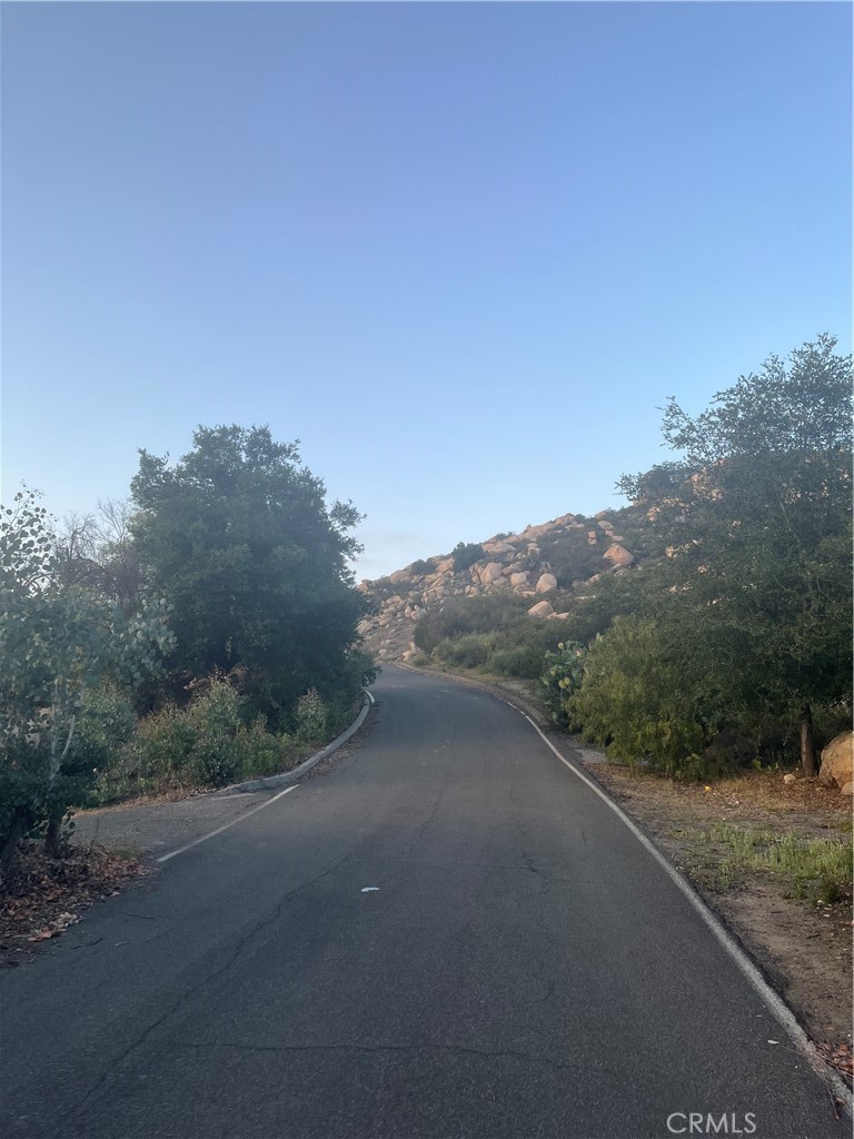 44810 La Mancha Road Temecula, CA 92590 - Photo 6 of 10 a view of a road with a mountain in the background