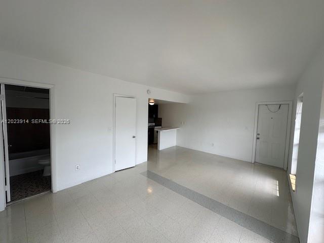 1400 Douglas Road, Unit 17 Coral Gables, FL 33134 - Photo 11 of 16 an empty room with closet