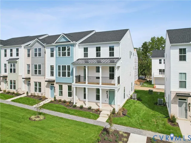 a sign on a pole on a street