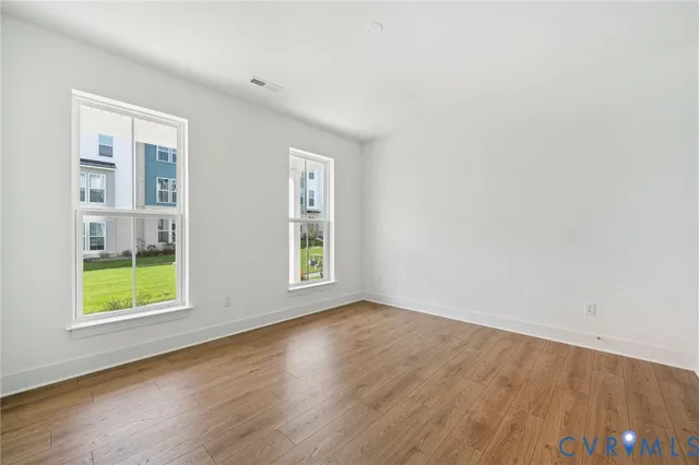 an empty room with windows